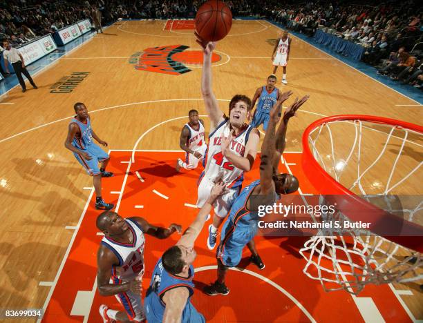 David Lee of the New York Knicks shoots against the Oklahoma City Thunder on November 14, 2008 at Madison Square Garden in New York City. NOTE TO...