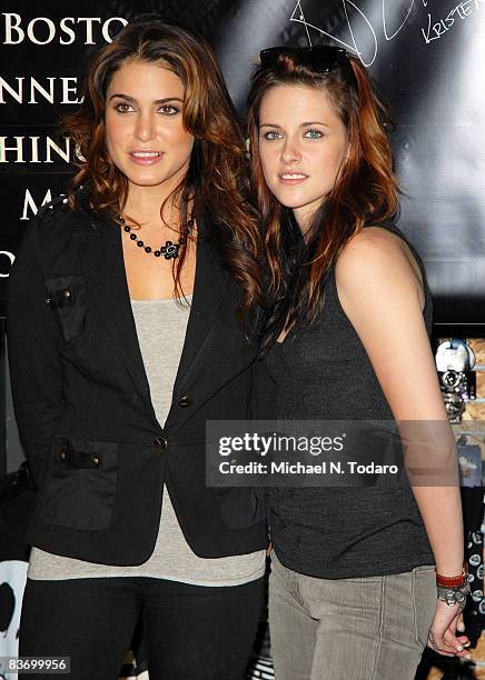 Nikki Reed and Kristen Stewart promote "Twilight" at Hot Topic in the Garden State Plaza on November 14, 2008 in Paramus, New Jersey.