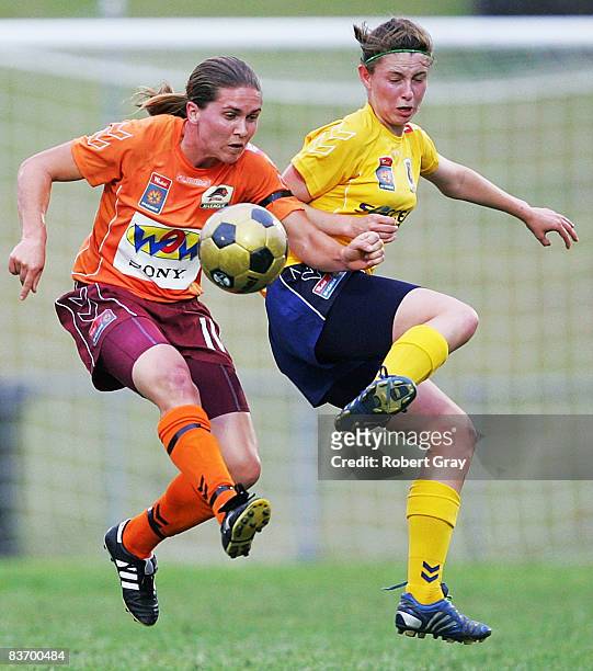 Elizabeth O'Reilly of the Mariners and Lana Harch of the Roar compete for the ball during the round four W-League match between the Central Coast...