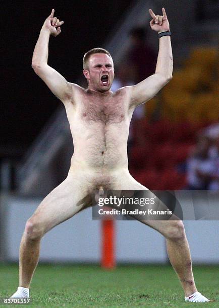 Streaker runs onto the field during the 2008 Rugby League World Cup Semi Final match between England and the New Zealand Kiwis at Suncorp Stadium on...
