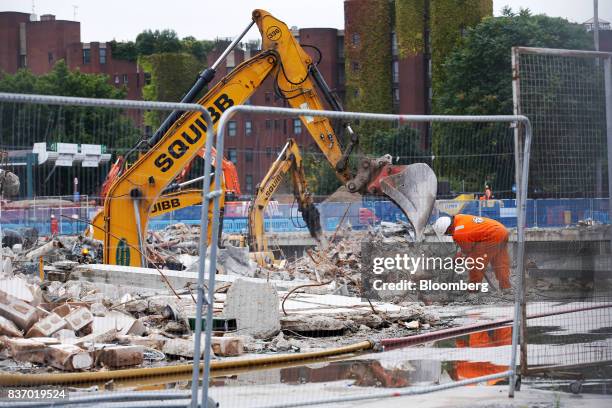 Demolition work takes place at the Nine Elms Square construction site in London, U.K., on Tuesday, Aug. 22, 2017. Billionaire Wang Jianlins Dalian...