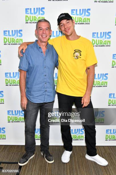 Diplo poses with Elvis Duran during his visit to "The Elvis Duran Z100 Morning Show" at Z100 Studio on August 22, 2017 in New York City.