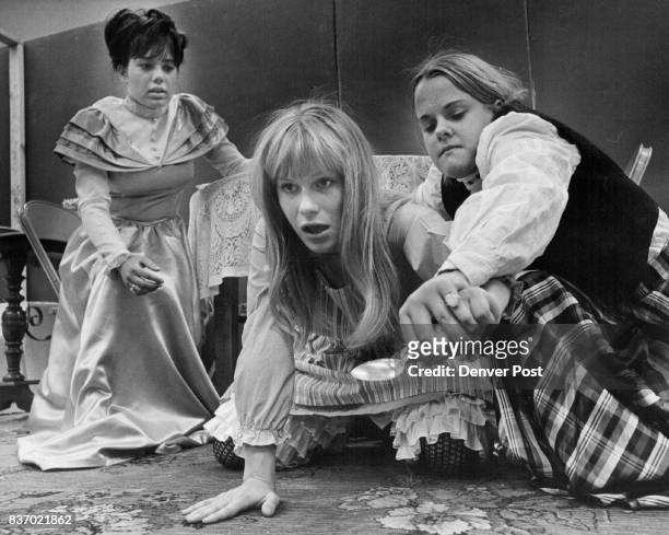Helen Keller, center, is restricted in scene from "Miracle Worker" Mrs. Keller, left, played by Brenda Burke, looks on while Annie Sullivan, Claudia...