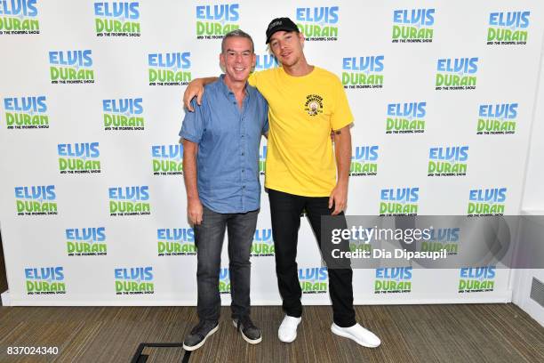 Diplo poses with Elvis Duran during his visit to "The Elvis Duran Z100 Morning Show" at Z100 Studio on August 22, 2017 in New York City.