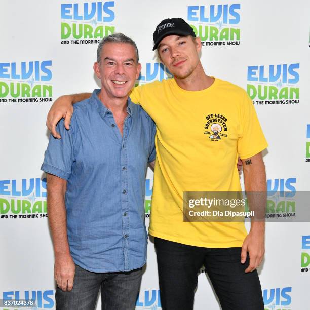Diplo poses with Elvis Duran during his visit to "The Elvis Duran Z100 Morning Show" at Z100 Studio on August 22, 2017 in New York City.