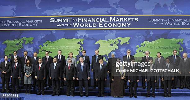 World leaders pose for a group photo at the opening of the G20 Summit hosted by US President George W. Bush on November 15, 2008 in Washington, DC....