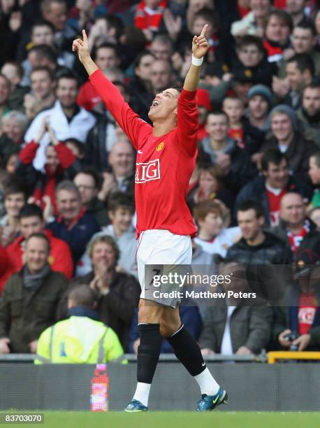 Cristiano Ronaldo of Manchester United celebrates scoring their first goal during the Barclays Premier League match between Manchester United and...