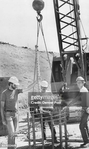 Workers Of Caissons, Inc., Englewood, Place Reinforcing Steel Employes, from left, are Frank Hoffman, William Bloesser and Robert Allen. Credit:...