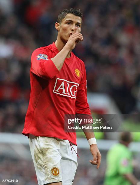 Cristiano Ronaldo of Manchester United tells the away fans to be quiet during the Barclays Premier League match between Manchester United and Stoke...