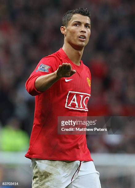 Cristiano Ronaldo of Manchester United tells the away fans to be quiet during the Barclays Premier League match between Manchester United and Stoke...