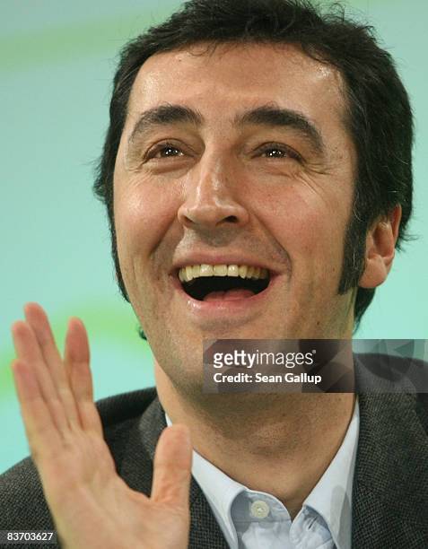 Cem Oezdemir, German Greens Party European Parliament deputy, smiles after being elected new Chairman of the Greens at the annual party congress on...