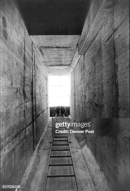 Ready For The Mushrooms Above photo shows bunker's main ventilation shaft as seen looking straight up from the bottom. At the top is a grate to keep...