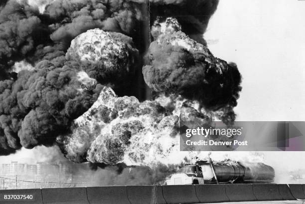 Tanker Bursts into flames after near Collision Thick smoke and flames from a gasoline tanker truck, above, after it burst into flames on Interstate...