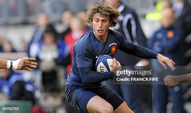 France's fullback Maxime Medard runs with the ball during the friendly rugby union match France vs. Pacific Islands on November 15 at the Bonal...
