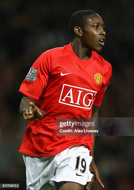 Danny Welbeck of Manchester United celebrates scoring his team's fourth goal during the Barclays Premier League match between Manchester United and...