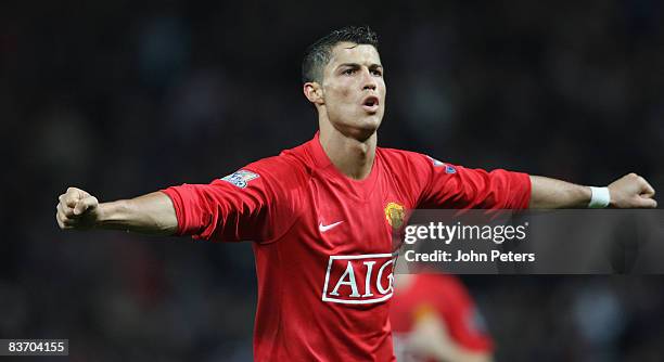 Cristiano Ronaldo of Manchester United celebrates scoring their fifth goal during the Barclays Premier League match between Manchester United and...