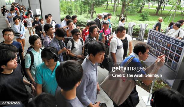 Line of more than 300 people forms two hours before the opening of Gundam Base Tokyo on August 19, 2017 in Tokyo, Japan. Gundam mania swooped into...