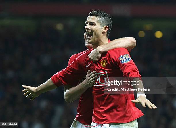 Cristiano Ronaldo of Manchester United celebrates scoring their fifth goal during the Barclays Premier League match between Manchester United and...