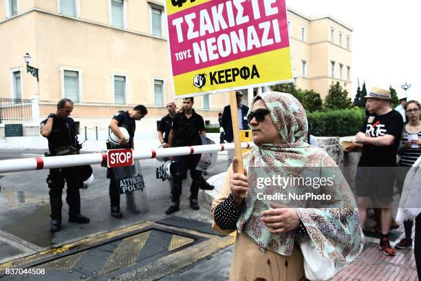 Afghan refugees protest against the Europe-Turkey agreement in Athens on Tuesday, August 22, 2017. Families of Afghans protest outside the Greek...