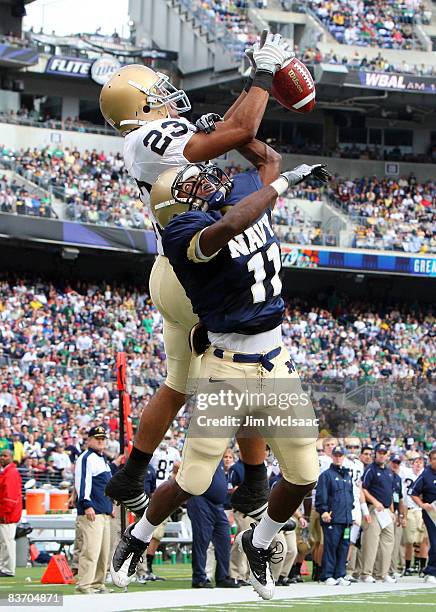 Ketric Buffin of the Navy Midshipmen breaks up a pass in the endzone against Golden Tate of the Notre Dame Fighting Irish on November 15, 2008 at M&T...