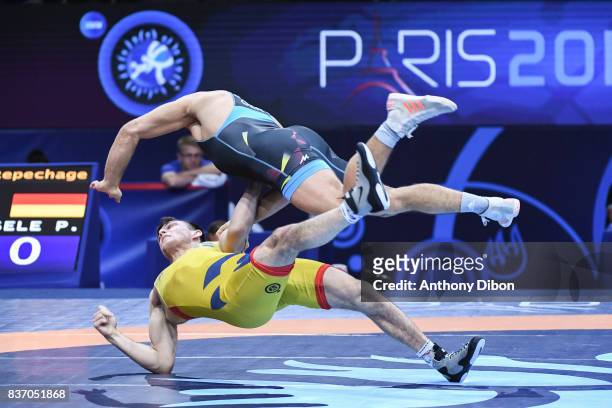 Bjurberg Kes A of Sweden and Eisel p of Germany during the Men's 80 Kg Greco-Roman competition during the Paris 2017 World Championships at...