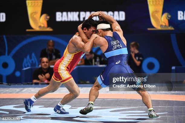 Zholchubekov K of kyrgyzstan and Fumita K of Japan during the Men's 59 Kg Greco-Roman competition during the Paris 2017 World Championships at...