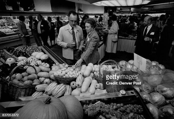 Jean and Barbara Braucht of Cherry Wills look at different varities of Squash: Butternut, Yellow, Delicata, Turbin Credit: The Denver Post