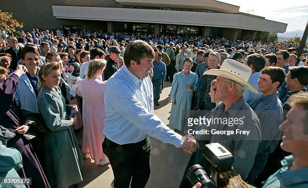 Willie Jessop , spokesman for the FLDS Church, shakes the hands of polygamy supporters from Colorado City, Arizona gather at the Fourth District...