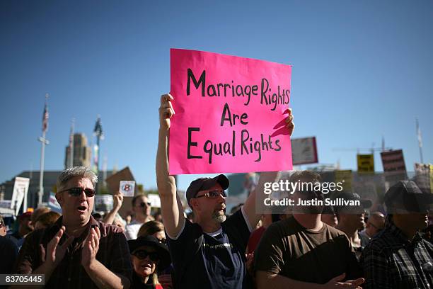 Supporter of gay marriage holds a sign saying "Marriage Rights Are Equal Rights" during a rally against the passing of Prop. 8 on November 15, 2008...