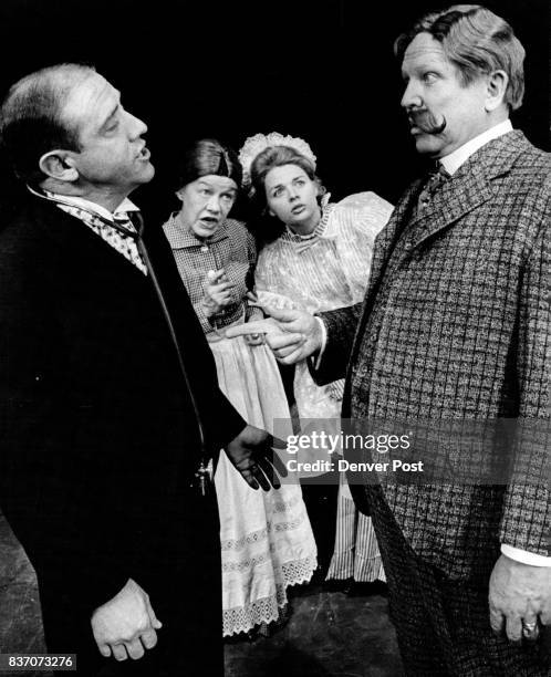 Francis Van Derbur, right, in the title role of "Life With Father," attempts to tell the doctor, played by Ned Austin, how to treat his wife....