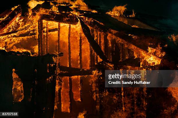 Home burns November 15, 2008 in Yorba Linda, California. Strong Santa Ana winds are fanning flames throughout Southern California, destroying...