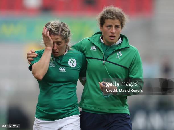 Alison Miller of Ireland is conforted by a team mate after their defeat during the Women's Rugby World Cup 2017 match between Ireland and Australia...