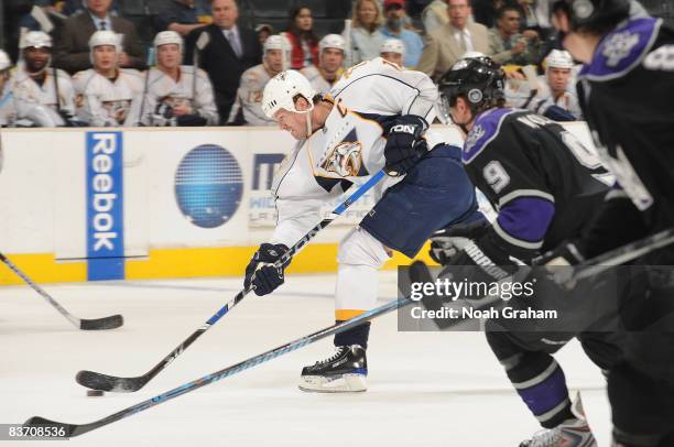 Jason Arnott of the Nashville Predators drives the puck against Drew Doughty and Oscar Moller of the Los Angeles Kings during the game on November...