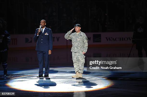 The Los Angeles Kings celebrate the Military during the singing of the National Anthem prior to the game against the Nashville Predators during the...