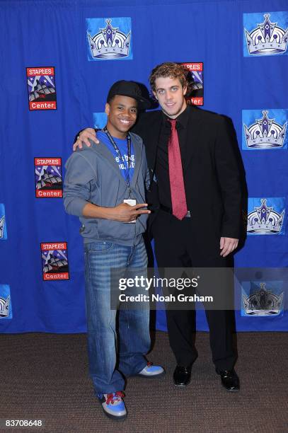 Anze Kopitar of the Los Angeles Kings poses for a photo with Actor Tristian Wilds after the game against the Nashville Predators on November 15, 2008...