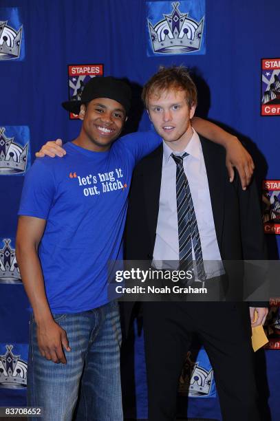 Erik Ersberg of the Los Angeles Kings poses for a photo with Actor Tristian Wilds after the game against the Nashville Predators on November 15, 2008...