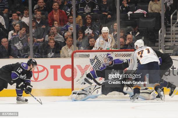 Dumont of the Nashville Predators shoots the puck for a third period goal against Erik Ersberg of the Los Angeles Kings during the game on November...