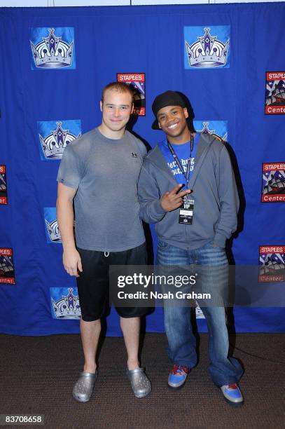 Dustin Brown of the Los Angeles Kings poses for a photo with Actor Tristian Wilds after the game against the Nashville Predators on November 15, 2008...