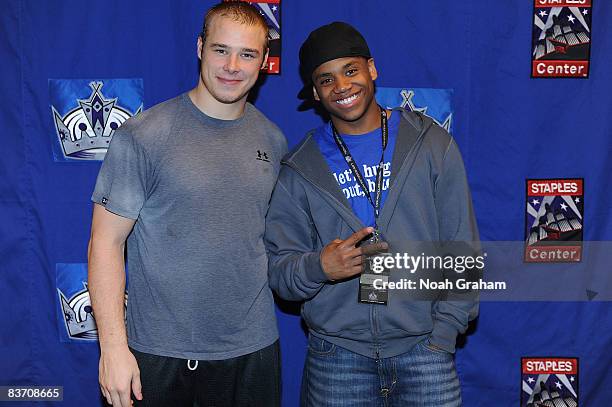 Dustin Brown of the Los Angeles Kings poses for a photo with Actor Tristian Wilds after the game against the Nashville Predators on November 15, 2008...