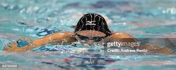 Cameron Van Der Burgh of South Africa competes during the heats of the men's 100m breaststroke event at the FINA short course swimming World Cup...