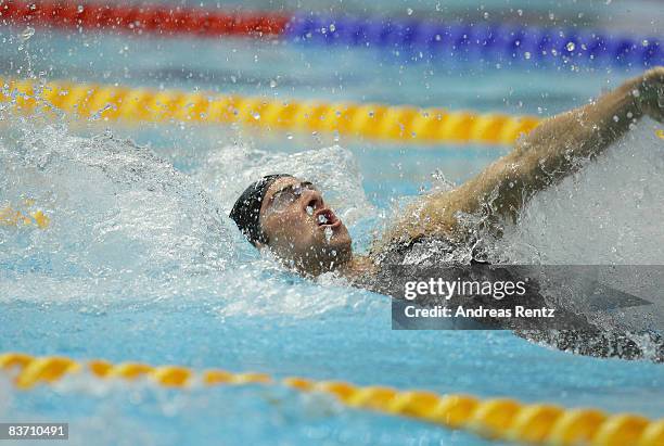 Randall Bal of the USA competes during the heats of the men's 50m backstroke event at the FINA short course swimming World Cup final on November 16,...