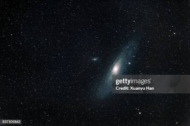 the andromeda galaxy m31 - andromeda galaxy stock-fotos und bilder