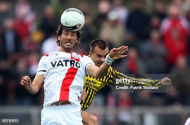 Dimitros Pappas of Oberhausen battles for the ball with Szilard Nemeth of Aachen during the Bundesliga match between Rot-Weiss Oberhausen and...