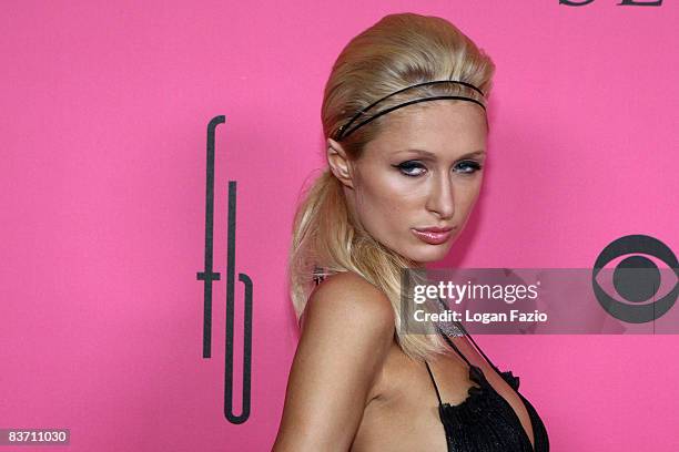 Paris Hilton arrives at the Victoria's Secret Fashion Show at Fontainebleau on November 15, 2008 in Miami Beach, Florida