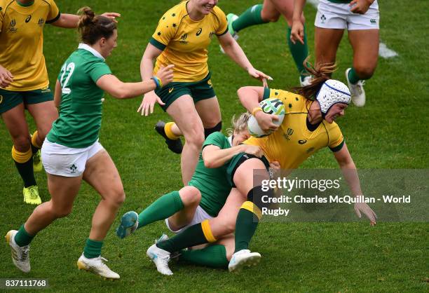 Alison Miller of Ireland and Sharni Williams of Australia during the Womens Rugby World Cup 5th place semi-final at the Kingspan Stadium on August...
