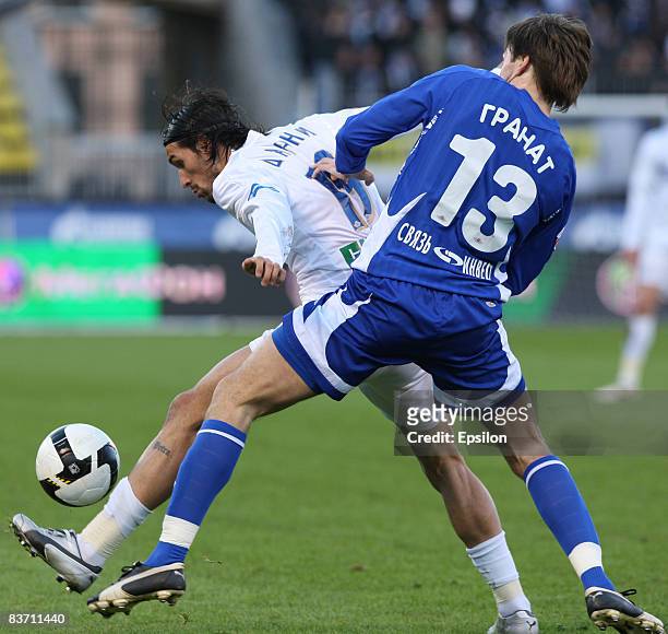 Danny of FC Zenit St Petersburg is challenged by Granat Vladimir of FC Dynamo Moscow during the Russian Premier League match between FC Zenit St...