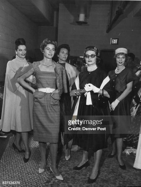 Fashion's Prima Donna, Pauline Trigere, poses with styles shown at the Hilton. Credit: Denver Post