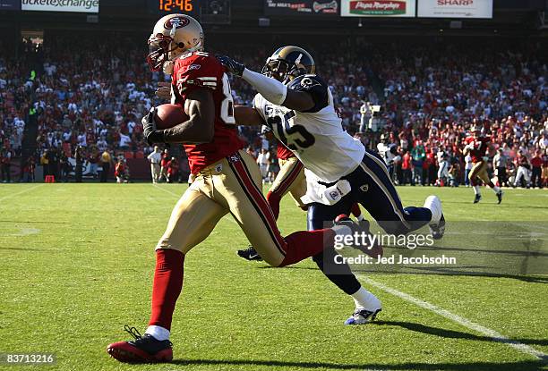 Bryant Johnson of the San Francisco 49ers catches a pass over Corey Chavous of the St. Louis Rams during an NFL game on November 16 2008 at...