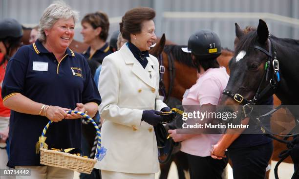 Princess Anne, Princess Royal is shown horses during a visit to the Riding for the Disabled Centre on November 17, 2008 in Christchurch, New Zealand.