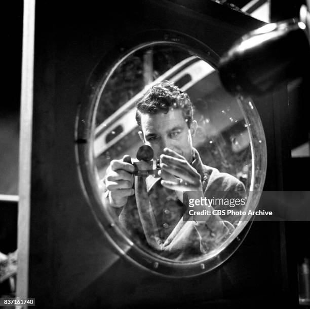 "Rod Brown of the Rocket Rangers" the CBS television science fiction series, broadcast live. Pictured is Cliff Robertson . Premiere episode titled:...